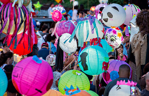 Lanterns and people fill E. Howard Ave. right before the start of the Decatur Lantern Parade on Friday, May 15, 2015.