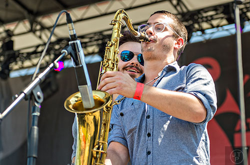 The Rad Trads'  Patrick Sargent (right) and Jared LaCasce perform during the Atlanta Jazz Fest at Piedmont Park on Saturday, May 23, 2015.