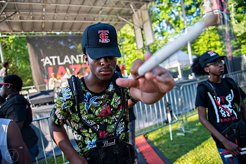 Andrew Seale with the Tri Cities High School drum line performs with Kebbi Williams and Wolfpack ATL during the Atlanta Jazz Fest at Piedmont Park on Saturday, May 23, 2015.