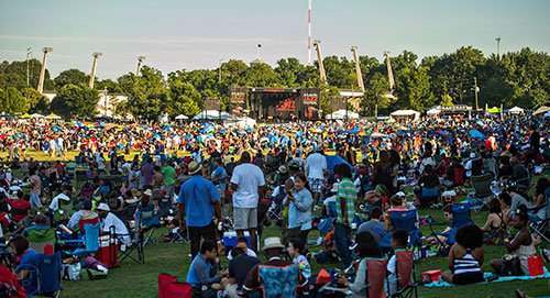 Thousands of people wait for the next performance to start on the main stage during the Atlanta Jazz Fest at Piedmont Park on Saturday, May 23, 2015.