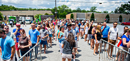 People wait in line to enter the Georgia Craft Beer Festival outside of Red Brick Brewing in Atlanta on Saturday, May 30, 2015. Hundreds of people came out to taste beer from 30 local Georgia breweries.   JONATHAN PHILLIPS / SPECIAL