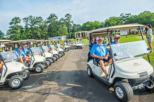 Bobby Jones (right), Bobby Jones and others named Bobby Jones head off to their first tee for the start of the Bobby Jones Open golf tournament at Braelinn Golf Club in Peachtree City on Tuesday, June 9, 2015. For 37 years men and women from all over the country meet for the tournament whose only stipulation is that their names are all Bobby Jones.    JONATHAN PHILLIPS / SPECIAL