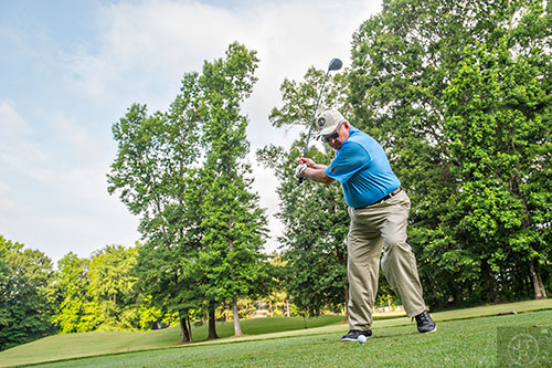 Bobby "El Robo" Jones from Durand, MI tees off during the Bobby Jones Open golf tournament at Braelinn Golf Club in Peachtree City on Tuesday, June 9, 2015. 