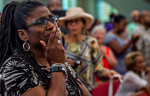 Tears stream down Shawnalea Garvin's cheek during the Prayer, Healing and Reconciliation Service for members of the Emanuel A.M.E. Church in Charleston, South Carolina who lost their lives earlier this week at Big Bethel A.M.E. Church in Atlanta on Friday, June 19, 2015. 
