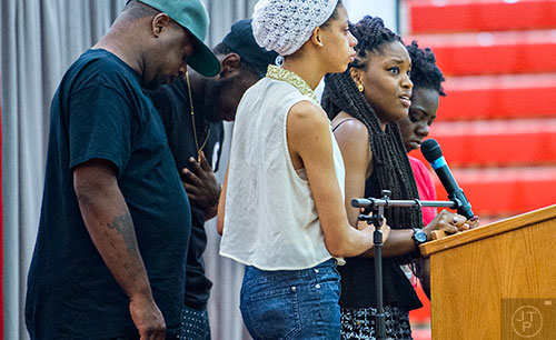 Myrical Lamar (center right) speaks during the memorial service for Wali Clanton Jr.at Dutchtown High School in Hampton on Thursday, June 18, 2015. 