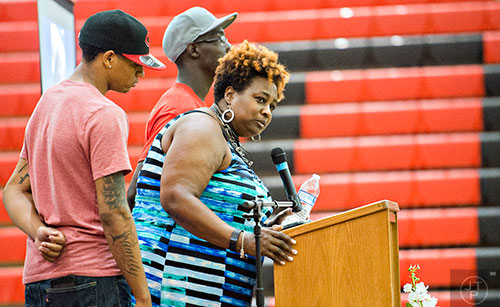 Anita Robinson (right) speaks during the memorial service for her nephew Wali Clanton Jr.at Dutchtown High School in Hampton on Thursday, June 18, 2015. 