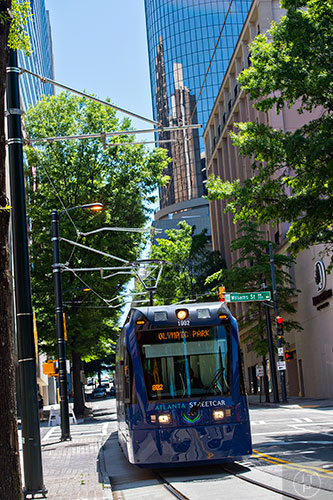 An Atlanta Streetcar travels down Andrew Young International Blvd. as it makes its way along the tracks through downtown.