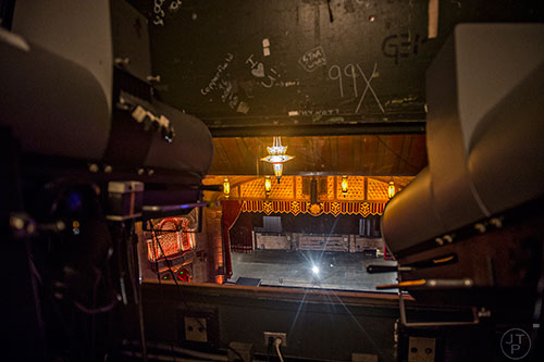 Spotlights inside the projection room look down on the stage at the Fox Theatre in Atlanta on Monday, June 22, 2015.