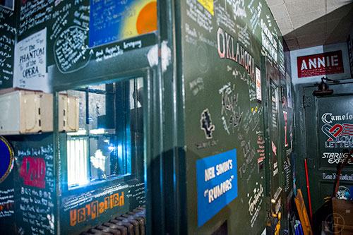 Show names painted on the walls nside the projection room at the Fox Theatre in Atlanta on Monday, June 22, 2015.