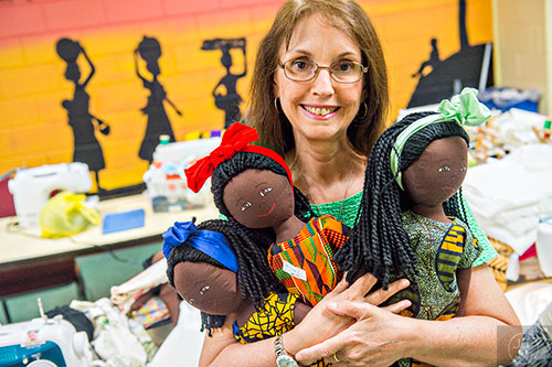 Cathy Palmer was raised in Africa as the child of American missionaries and became an extremely prolific and successful Christian novelist. Five years ago Palmer started the Refugee Sewing Society. Women of all nationalities and faiths meet three days a week in Clarkston and sew, knit and weave a variety of products that are sold in a small store, at festivals and via Etsy. 