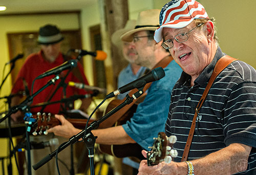 Jim Coleman with the band SmokeRise performs during the inaugural BBQ & Bluegrass at Barrington Hall in Roswell on Saturday, July 4, 2015. 