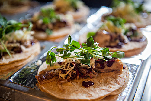 Tacos  with marinated cabbage, pea shoot and a mix of braised pork, chicken liver and chicken heart during Eat Me Speak Me at Gato off of McLendon Ave. in Atlanta on Friday, July 3, 2015.