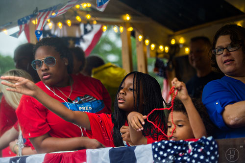 The Avondale Estates 4th of July Parade makes its way down Clarendon Ave. on Saturday. 