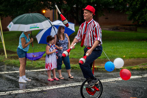 The Avondale Estates 4th of July Parade makes its way down Clarendon Ave. on Saturday. 