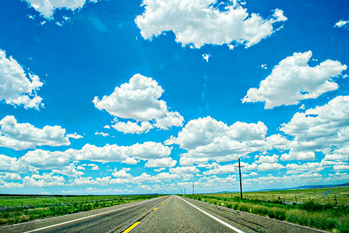Big puffy clouds along Route 66 in Arizona on Friday, July 17, 2015.