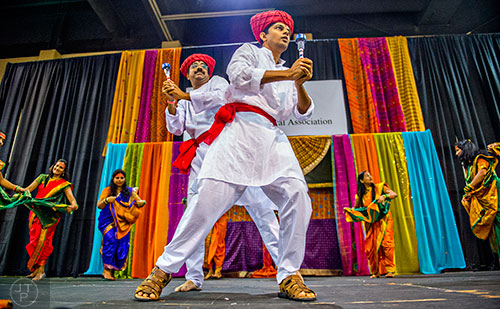 Pranot Bhosala (center right) and Sachin Sangole (center left) perform during the Festival of India at the Gwinnett Center in Duluth on Saturday, August 22, 2015. 
