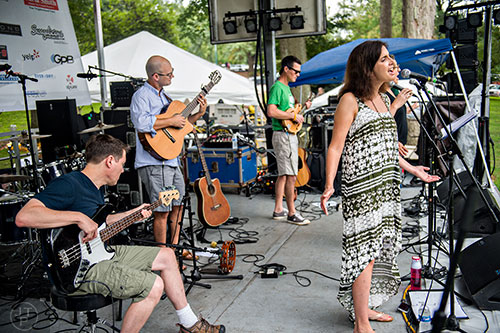 The Paulines' Ben Robinson (left), Kevin Hill, Don Wallace and Laura Wells perform during the 13th annual Grant Park Summer Shade Festival on Saturday, August 29, 2015. 