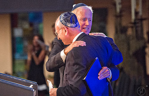 Vice President of the United States Joe Biden (right) hugs Stuart Eizenstat during the 2015 Fran Eizenstat and Eizenstat Family Annual Lecture at the Ahavath Achim Synagogue in Atlanta on Thursday, September 3, 2015.   