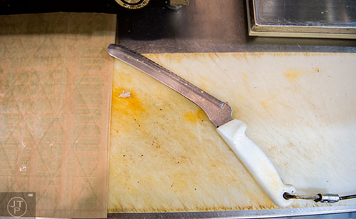 A tethered knife lies on the counter of Fresh to Order at the Hartsfield Jackson Atlanta International Airport on Wednesday, September 2, 2015. 