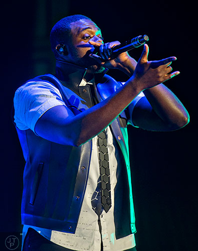 Pentatonix's Kevin Olusola performs on stage at Aaron's Amphitheatre at Lakewood in Atlanta on Thursday, September 10, 2015. Pentatonix opened for Kelly Clarkson.   