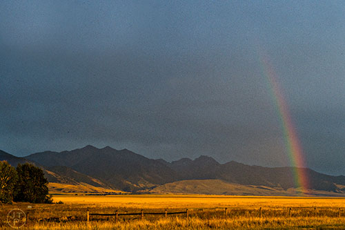 A rainbow appears through the clouds in Montana on Wednesday, August 5, 2015.
