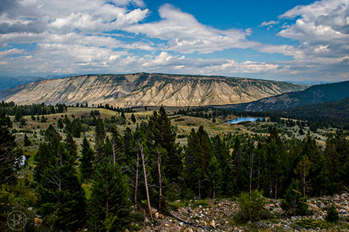 Yellowstone encompasses over 250 square miles in Wyoming and along with that numerous mountains whose peaks are usually in the 10,000 foot elevation range.