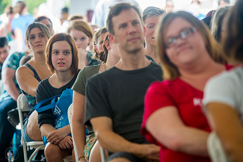 Rachel Buckley (left) listens to author David Levithan speak during the Decatur Book Festival on Saturday. 