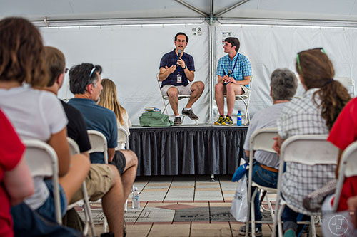 Author David Levithan (left) speaks to the crowd about his newest book while on the Teen Stage with Will Walton during the Decatur Book Festival on Saturday. 