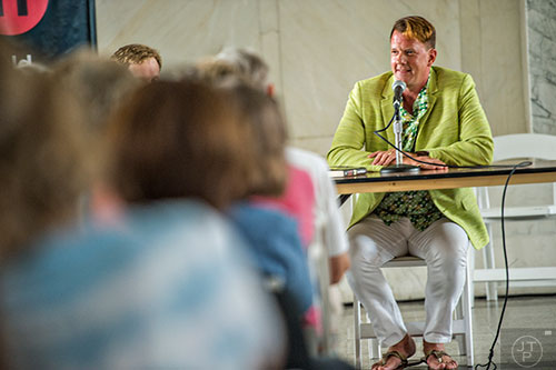 Author Jamie Brickhouse speaks to the crowd about his newest book during the Decatur Book Festival on Saturday. 