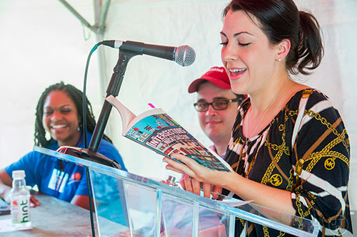 Dena Mellick (right) reads a selection from Decaturish's columnist Nicki Salcedo's new book Intersections during the Decatur Book Festival on Saturday.