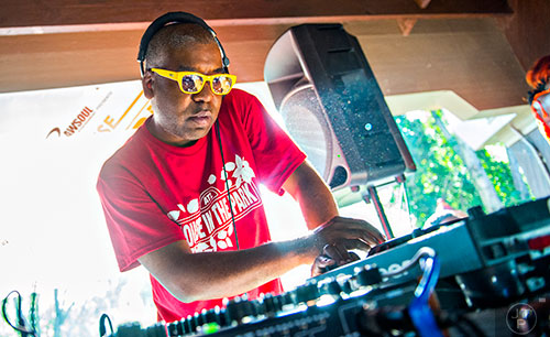 D.J. Kai Alce spins tunes during House at the Park at Grant Park in Atlanta on Sunday, September 6, 2015.