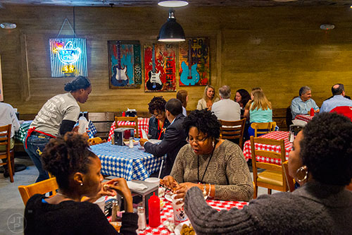 Inside the dining area at the newly opened Gus's World Famous Fried Chicken inside the Mall at Peachtree Center in Atlanta on Thursday, August 20, 2015.