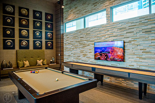 The game room  inside The Office off of Piedmont Ave. in Atlanta offers pool, shuffleboard and arcade style video games.