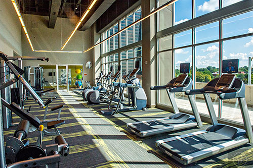 The fitness studio comes stocked with the latest equipment to stay in shape.