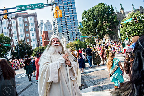 Dressed as Gandalf the White, Rich Sabo marches down Peachtree St. during the annual DragonCon Parade in Atlanta on Saturday, September 5, 2015.  