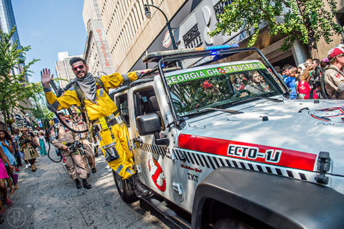 Fernando Hernandez waves as he rides the Ecto-1J during the annual DragonCon Parade in Atlanta on Saturday, September 5, 2015.  