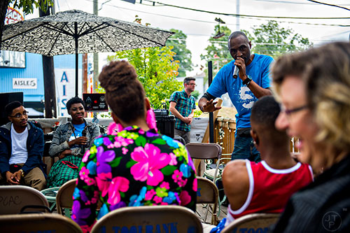 Kevin Shine leads a recording artist discussion with Tenette Smith and Daynin Harris during the 5 Arts Fest in the Little Five Points neighborhood of Atlanta on Saturday, September 12, 2015. 