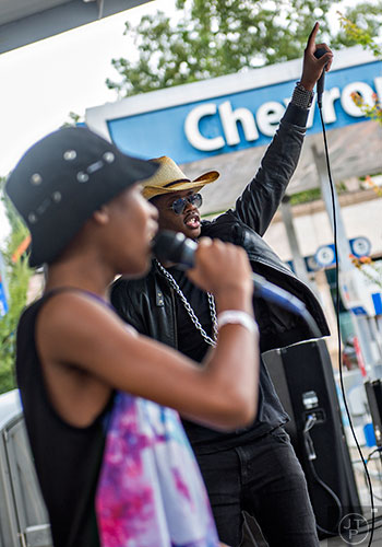 Ziggy the Rockstar (right) and Xavion Shelton perform on the main stage during the 5 Arts Fest in the Little Five Points neighborhood of Atlanta on Saturday, September 12, 2015.