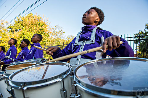 Nicholas King (right) performs with the Kipp Schools drumline before the start of the Families First groundbreaking ceremony at the historic E.R. Carter Elementary School in Atlanta on Thursday, September 17, 2015. 