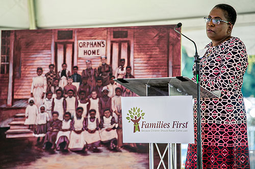 Families First CEO Kim Anderson speaks during the organization's groundbreaking ceremony at the historic E.R. Carter Elementary School in Atlanta on Thursday, September 17, 2015.  