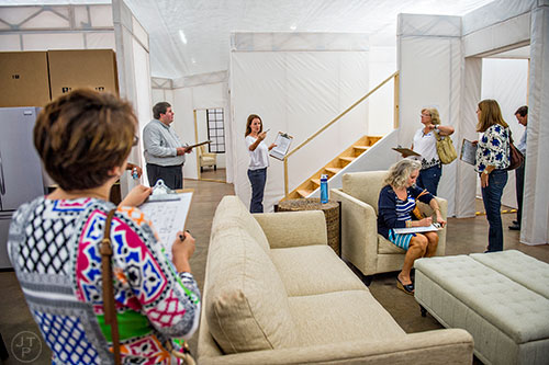 Alisa Hamilton (center) leads a focus group on a potential townhouse layout at the Pulte Group's Innovation Center in Norcross on Monday, September 14, 2015. 