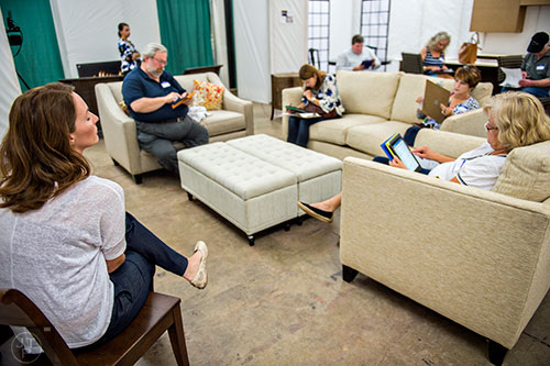 Alisa Hamilton (left) leads a focus group on a potential townhouse layout at the Pulte Group's Innovation Center in Norcross on Monday, September 14, 2015. 