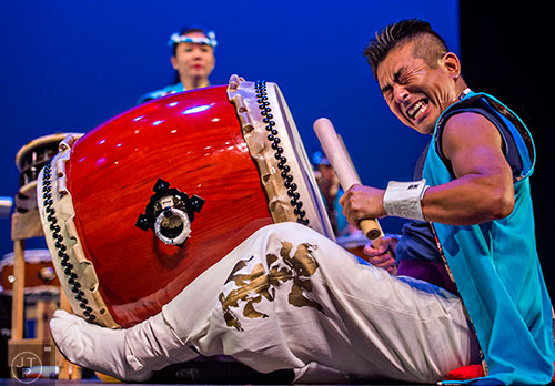 Nagatoshi Sagara beats his taiko drum as he performs on stage during JapanFest at the Infinite Energy Center in Duluth on Saturday, September 19, 2015.  