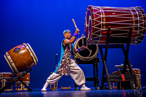 Takemasa Ishikura beats his taiko drum as he performs on stage during JapanFest at the Infinite Energy Center in Duluth on Saturday, September 19, 2015. 