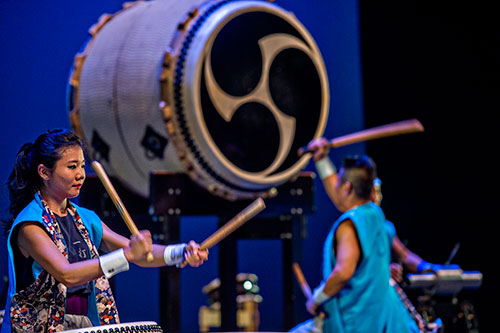 Keiko Ishikura beats her taiko drum as she performs on stage during JapanFest at the Infinite Energy Center in Duluth on Saturday, September 19, 2015.  