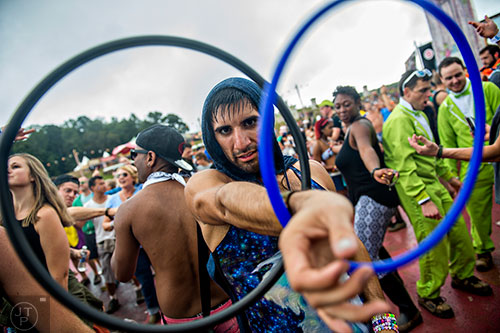 Rick Santizo plays with hula hoops during TomorrowWorld in Chattahoochee Hills on Saturday, September 26, 2015. 