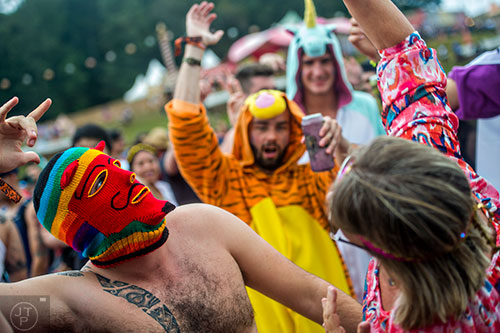 Yann Taillandy (left) dances with Andrea Smith during TomorrowWorld in Chattahoochee Hills on Saturday, September 26, 2015. 