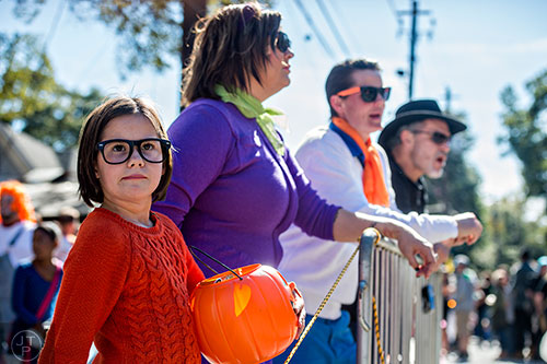 Ryan Wilson (left), Alexis Roland and Melanie Wilson wait for the start of the Little Five Points Halloween Parade in Atlanta on Saturday, October 17, 2015. 