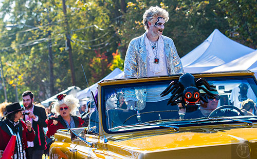 Grand Marshal Steve Harris rides up the street during the Little Five Points Halloween Parade in Atlanta on Saturday, October 17, 2015. 