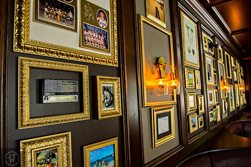 Personal items that have significant meaning to the three owners of Venkman's line the back wall of the restaurant.